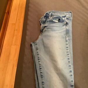 Womens skinny kid rise distressed jeans